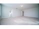 Bright bedroom with carpet flooring and access to bathroom at 2746 Stanwood Dr, Kissimmee, FL 34743