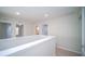 Upstairs hallway with access to bedrooms and bathroom at 2746 Stanwood Dr, Kissimmee, FL 34743