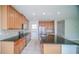 Modern kitchen with granite countertops and stainless steel appliances at 2746 Stanwood Dr, Kissimmee, FL 34743