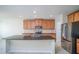 Modern kitchen featuring granite countertops and stainless steel appliances at 2746 Stanwood Dr, Kissimmee, FL 34743