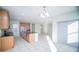 Spacious kitchen with island, stainless steel appliances, and light wood cabinets at 2746 Stanwood Dr, Kissimmee, FL 34743