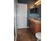 Bathroom featuring a double vanity sink with tiled floor and shower at 515 Haywood Ln, Lake Alfred, FL 33850