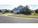 One story house, white garage door, and lush green lawn at 515 Haywood Ln, Lake Alfred, FL 33850