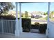 View from front porch of bright blue house, showing front yard and street at 515 Haywood Ln, Lake Alfred, FL 33850
