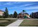 Community playground with playset and walking path at 515 Haywood Ln, Lake Alfred, FL 33850