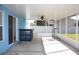 Covered patio with a view of the backyard, and a small bar at 515 Haywood Ln, Lake Alfred, FL 33850