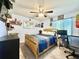 Cozy bedroom with a double bed, and a workspace with a computer at 5271 Whitstable Way # 1, Orlando, FL 32812