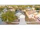 An aerial view of a single-Gathering house with a driveway and yard at 632 Kermarah Ave, Haines City, FL 33844