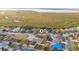 Aerial view of home near conservation and lake at 632 Kermarah Ave, Haines City, FL 33844