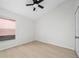 Spacious bedroom with ceiling fan and new flooring at 632 Kermarah Ave, Haines City, FL 33844