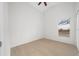 Charming bedroom with ceiling fan and backyard view at 632 Kermarah Ave, Haines City, FL 33844