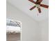 Simple bedroom with ceiling fan and backyard view at 632 Kermarah Ave, Haines City, FL 33844