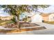 House exterior view, featuring a single-story home with a two-car garage and front yard at 632 Kermarah Ave, Haines City, FL 33844