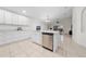Modern kitchen with white cabinets and stainless steel appliances at 632 Kermarah Ave, Haines City, FL 33844