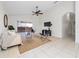 Living room with vaulted ceiling and neutral color palette at 632 Kermarah Ave, Haines City, FL 33844
