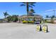Gated entrance to community with designated areas for new and returning guests at 8048 King Palm Cir, Kissimmee, FL 34747