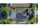 House with solar panels and a private pool, nestled in a quiet neighborhood at 8059 King Palm Cir, Kissimmee, FL 34747