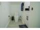 Clean bathroom with toilet and modern flooring at 8059 King Palm Cir, Kissimmee, FL 34747