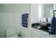 Modern bathroom with a vessel sink and marble tile at 8059 King Palm Cir, Kissimmee, FL 34747