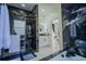 Elegant bathroom with a walk-in shower, soaking tub, and modern vanity at 8059 King Palm Cir, Kissimmee, FL 34747