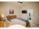 Lovely bedroom with ensuite bathroom and TV at 8059 King Palm Cir, Kissimmee, FL 34747