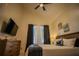 Bright bedroom with a king-size bed, large windows, and a dresser at 8059 King Palm Cir, Kissimmee, FL 34747