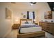Comfortable bedroom with a dresser and ceiling fan at 8059 King Palm Cir, Kissimmee, FL 34747
