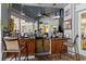 Outdoor community bar with seating and tropical decor at 8059 King Palm Cir, Kissimmee, FL 34747