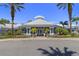 Community center with palm trees and landscaping at 8059 King Palm Cir, Kissimmee, FL 34747