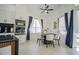 Kitchen dining area with round table and four chairs at 8059 King Palm Cir, Kissimmee, FL 34747