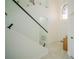 Elegant entryway with modern staircase and high ceilings at 8059 King Palm Cir, Kissimmee, FL 34747
