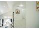 Bright hallway with artwork and doors at 8059 King Palm Cir, Kissimmee, FL 34747