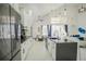Open concept kitchen with island and stainless steel appliances at 8059 King Palm Cir, Kissimmee, FL 34747