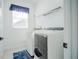 Bright laundry room complete with washer and dryer at 8059 King Palm Cir, Kissimmee, FL 34747