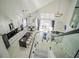 Open concept kitchen, living and dining area with high ceilings at 8059 King Palm Cir, Kissimmee, FL 34747