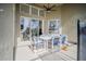 Covered patio with table and chairs, pool access at 8059 King Palm Cir, Kissimmee, FL 34747
