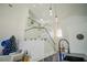 Modern glass and metal staircase leading to the second floor at 8059 King Palm Cir, Kissimmee, FL 34747