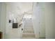 Contemporary staircase with glass railings and modern design at 8059 King Palm Cir, Kissimmee, FL 34747