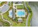 Aerial view of community pool, water features, and clubhouse at 8127 Cadman St, Orlando, FL 32832