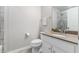 Clean bathroom with tile shower and vanity at 8127 Cadman St, Orlando, FL 32832