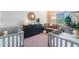 Bedroom with two cribs, a dresser, and a neutral color scheme at 8127 Cadman St, Orlando, FL 32832