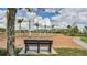 Relaxing community fountain with a brick walkway and bench at 8127 Cadman St, Orlando, FL 32832