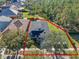 Aerial view of a house and surrounding neighborhood at 1592 Lincolnshire Drive, Deland, FL 32724