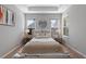 Spacious bedroom with neutral walls and a cozy bed at 1592 Lincolnshire Drive, Deland, FL 32724