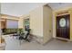 Inviting front porch with seating area and stylish door at 1592 Lincolnshire Drive, Deland, FL 32724