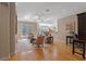 Spacious living room with hardwood floors and access to a patio at 1592 Lincolnshire Drive, Deland, FL 32724