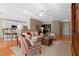 Open living room with hardwood floors and built-in shelving at 1592 Lincolnshire Drive, Deland, FL 32724