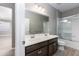 Double vanity bathroom with a shower/tub combo at 1722 Farmstead Ln, Oviedo, FL 32765
