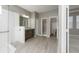 Bathroom with double vanity, walk-in shower, and toilet at 1722 Farmstead Ln, Oviedo, FL 32765