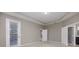 Bright bedroom with door leading to the backyard at 1722 Farmstead Ln, Oviedo, FL 32765